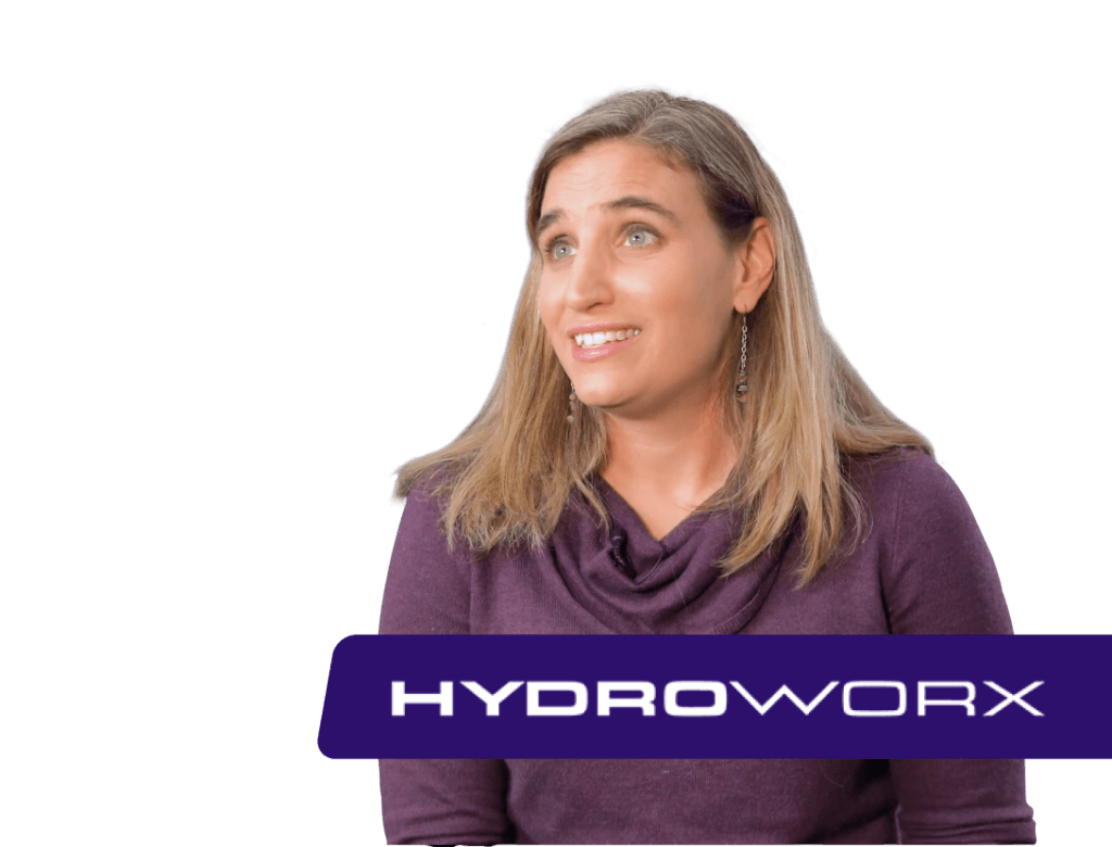 Femme en violet, regardant à droite, logo HYDROWORX en dessous.