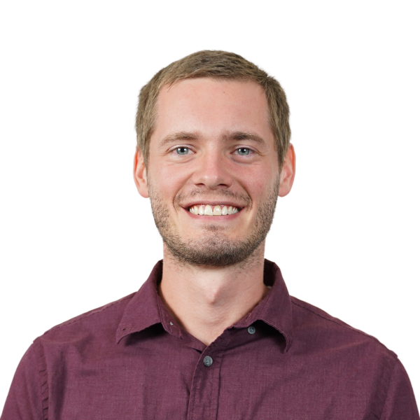 Portrait of a smiling man in burgundy shirt, transparent background.