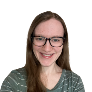 Smiling woman with glasses and long hair against a white background