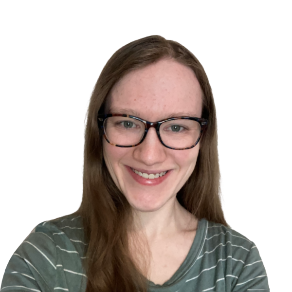 Smiling woman with glasses and long hair against a white background