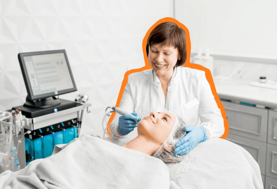 Female dermatologist working on a patient's face