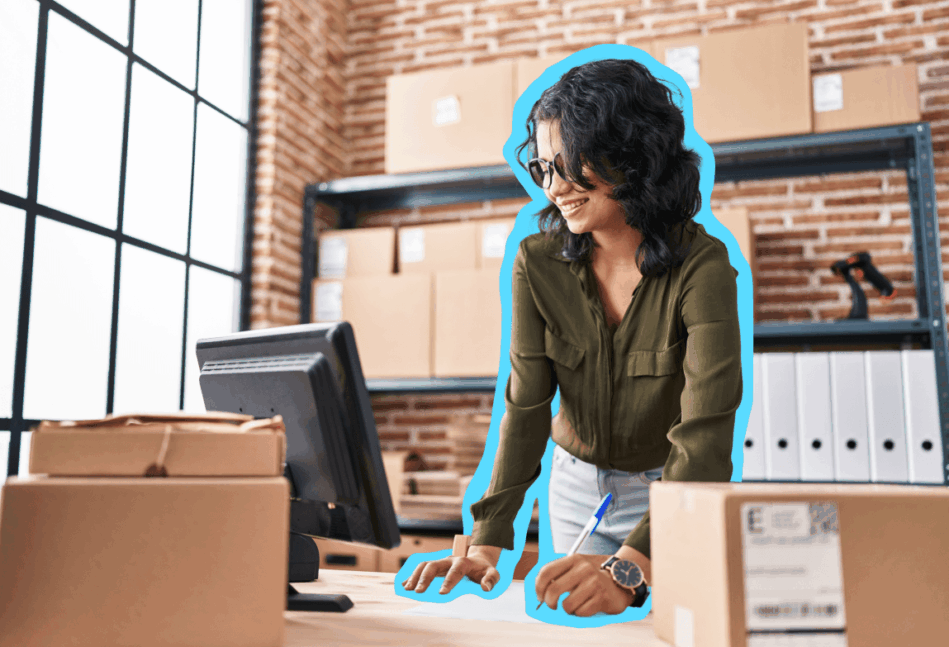 Woman in a store looking at a computer