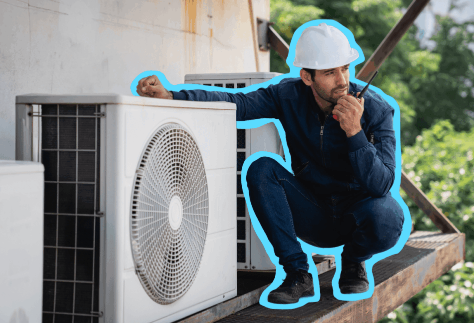 HVAC technician looking at an HVAC system