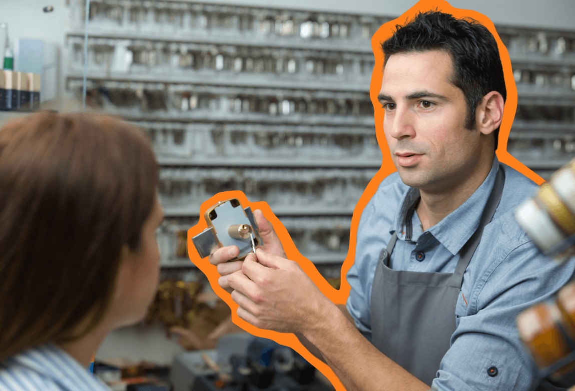 Locksmith showing a product to a customer